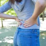 Closeup Young Woman Touching Waist Park